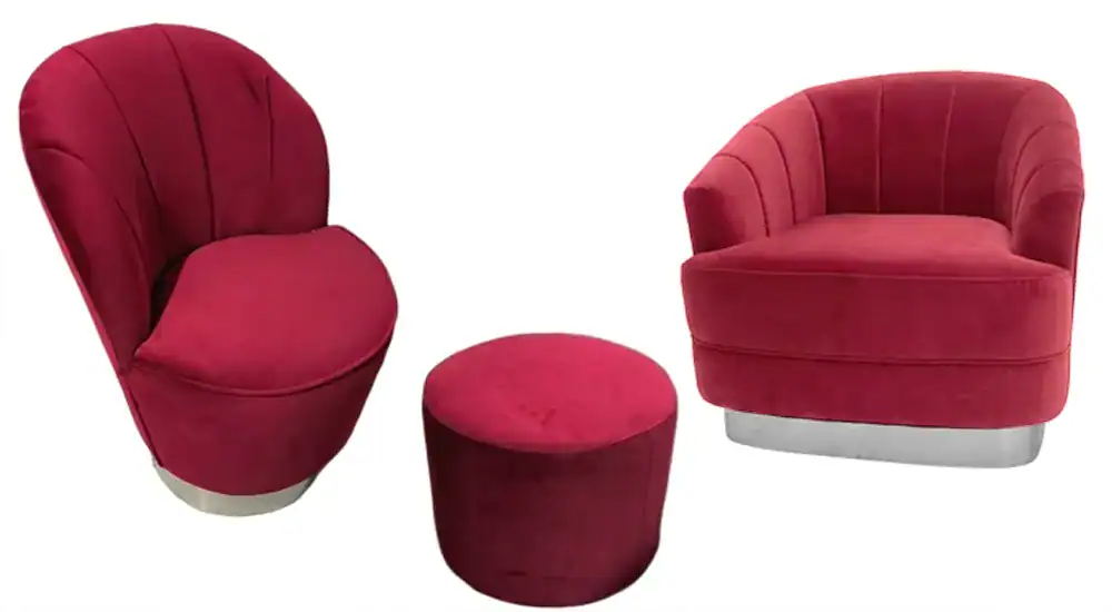 Custom crimson velvet commercial seating set featuring a scalloped shell-back armchair, cylindrical ottoman stool, and vertical channel-tufted tub chair with brushed metal base for retail boutique fit-outs.