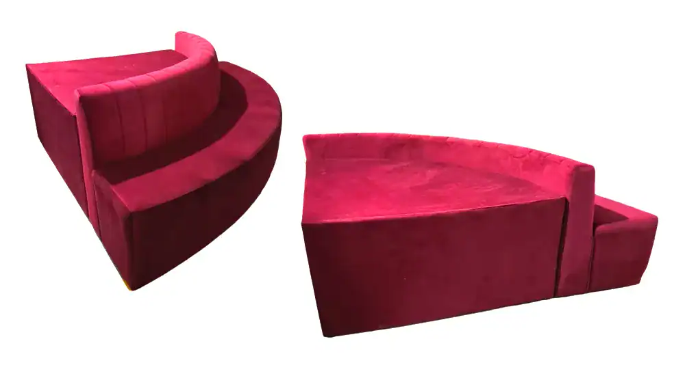 Custom deep-wedge modular velvet banquette sofa and radial curved retail seating for luxury commercial interior fit-outs and contract manufacturing.