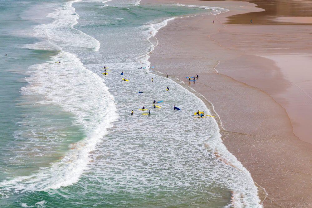surfing at Mawgan Porth