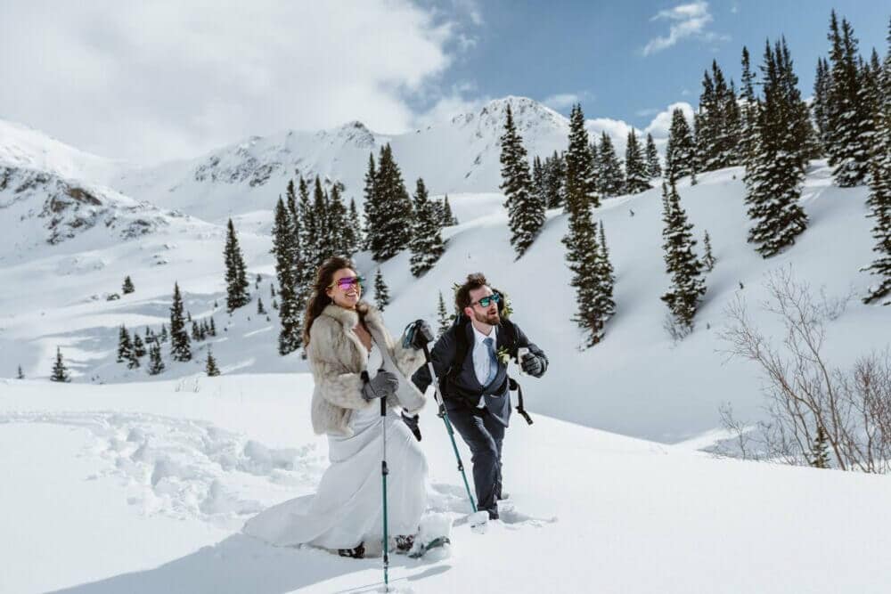 Bride and Groom Snowshoeing Winter Elopement Guide