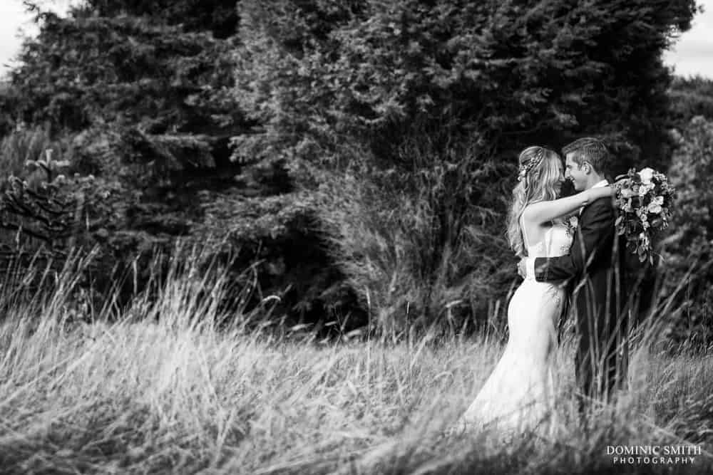 Couple photo taken in the meadow at Nymans