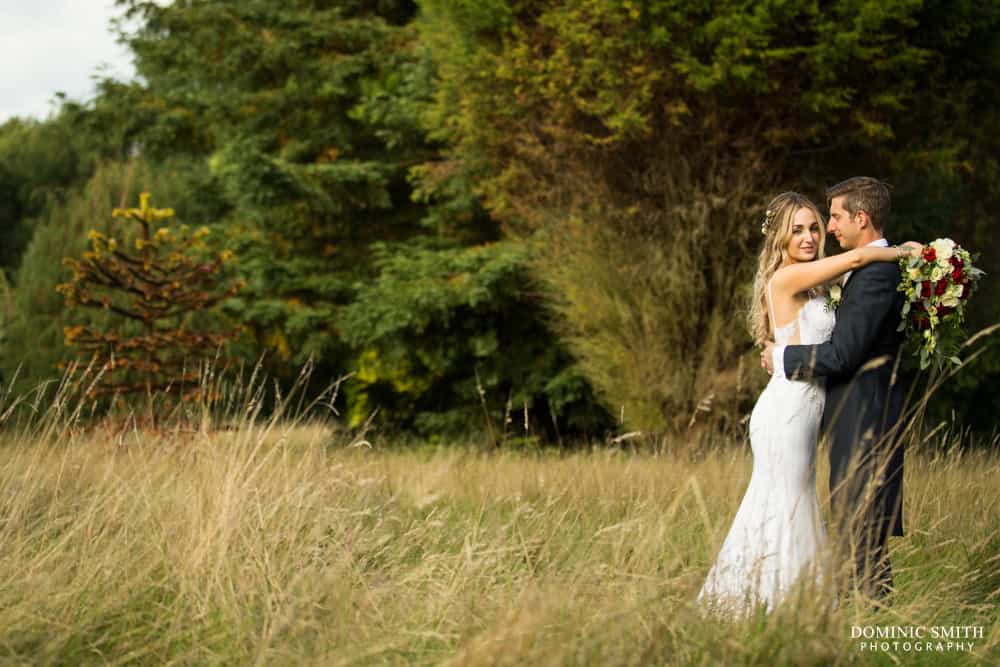 Couple photo taken in the meadow at Nymans