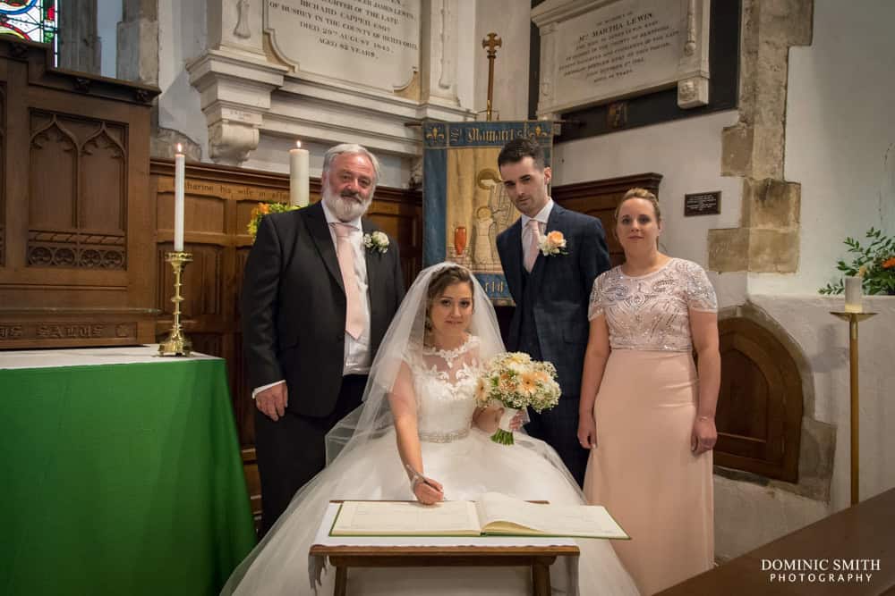 Signing the register at St Margarets Church Ifield