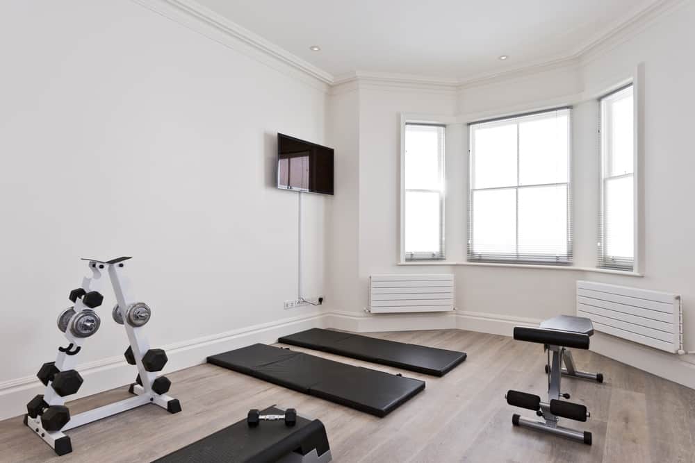 A white room filled with black equipment
