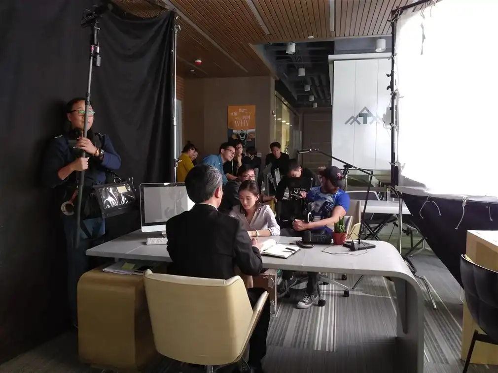 Fixer team managing production on set in Shanghai