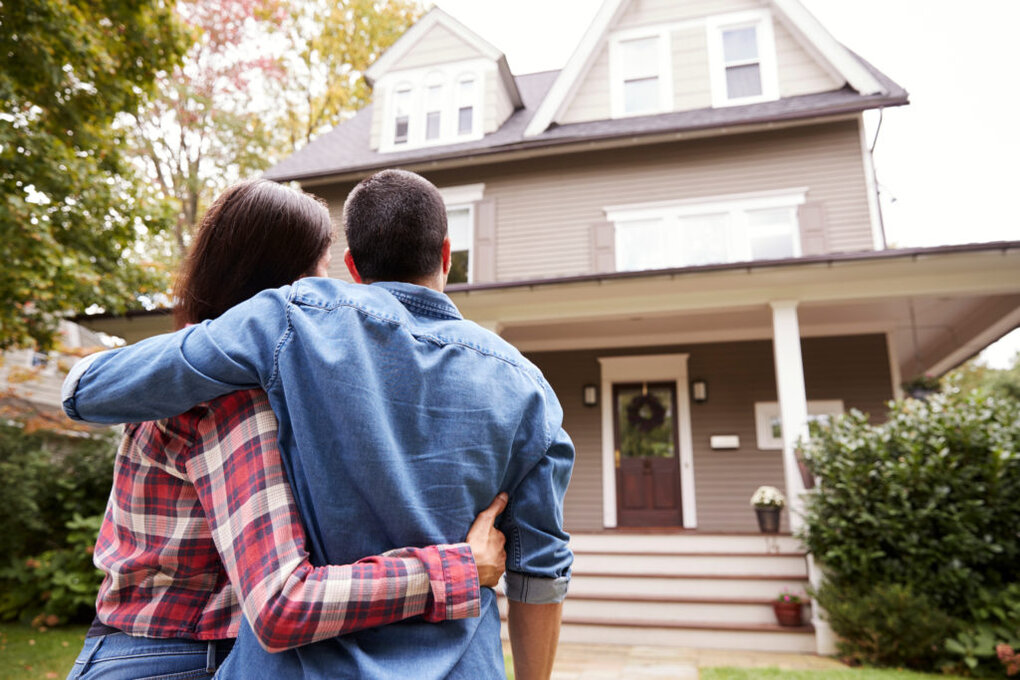 Couple Looking at the House | Real Estate Lawyer | One80Law Group
