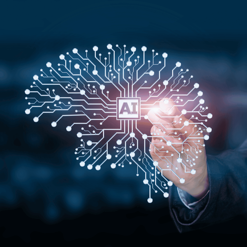Grafica che mostra un cervello con il logo AI al centro e una rete neurale che lo forma; una mano in secondo piano lo tocca, causando un bagliore, a simboleggiare interazione con l’intelligenza artificiale.