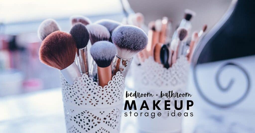 Makeup brushes set in white decorative containers on a vanity countertop.