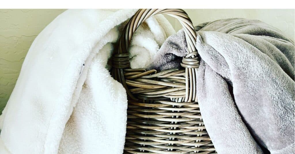 A basket storing blankets