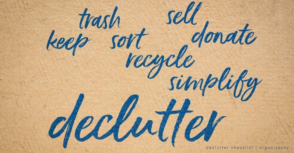 Words related to "declutter" written in blue ink on tan paper