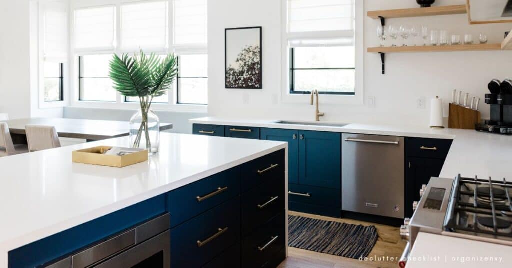 Bright kitchen with blue cabinets and open shelves