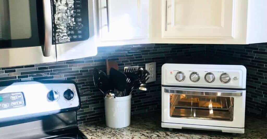 Combination air fryer toaster oven on a kitchen counter