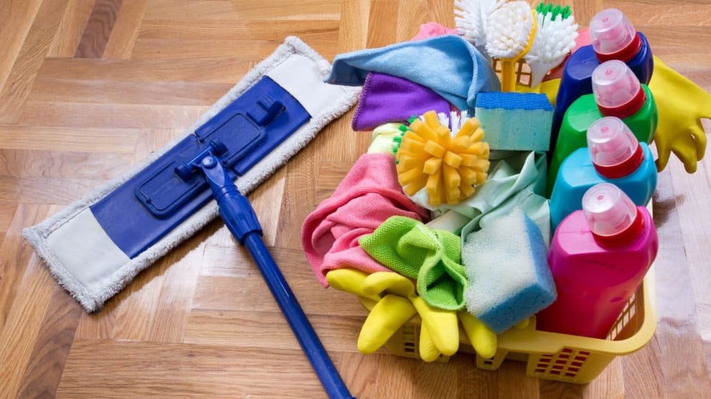 house cleaning supplies in a bucket