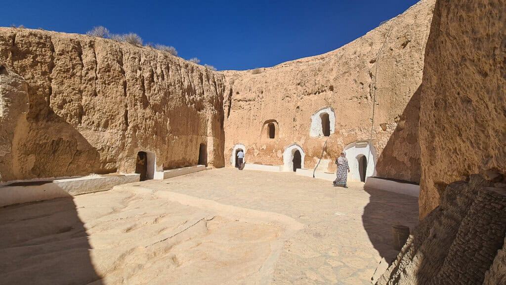 Inner courtyard of a traditional troglodyte home carved into the ground in Matmata, southern Tunisia