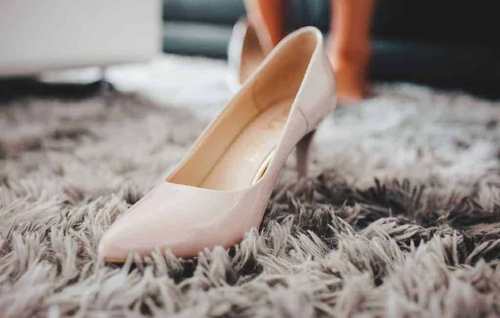 white shoe on a fluffy rug