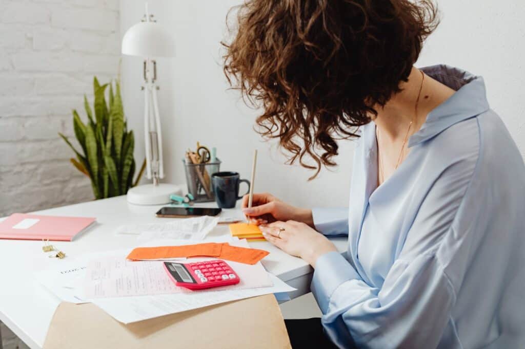 Prevent Foreclosure in San Diego - A Woman Computing Finances