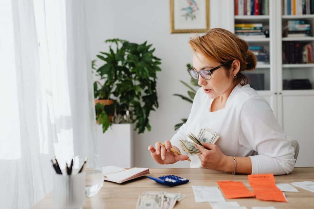 San Diego Home Offers - A Woman Doing Some Budgeting