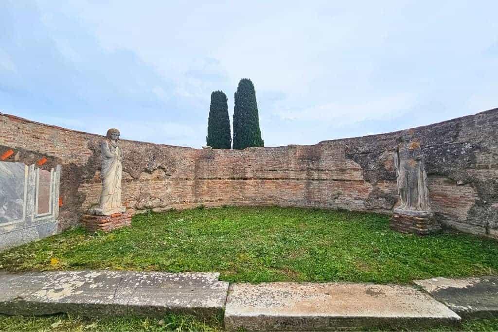 Roman courtyard ruins in Ostia Antica, a peaceful and historic spot in the archaeological site.