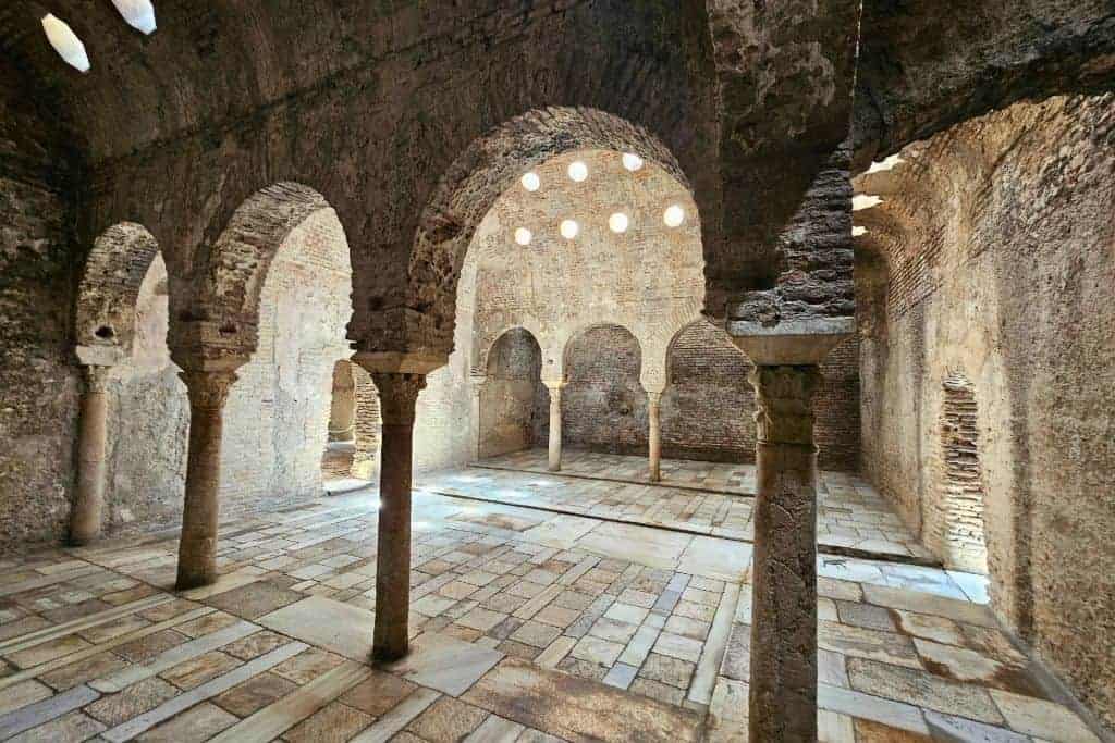 Interior of El Bañuelo, ancient Arab baths in Granada dating back to the 11th century – one of the city’s best-preserved Islamic sites and an underrated historic hidden gem.