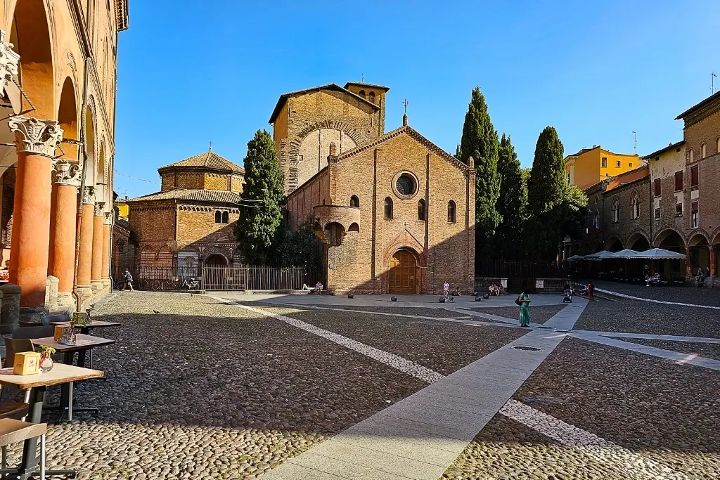 View of the Basilica of Santo Stefano in Bologna, a quiet medieval complex that’s a must-see for travelers wondering is Bologna worth visiting for history.