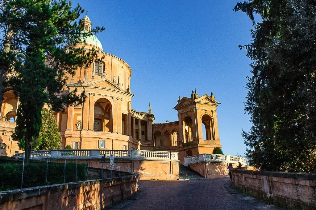 The hilltop Sanctuary of the Madonna di San Luca, a Bologna landmark reached by the world’s longest portico—worth visiting for views and spirituality.