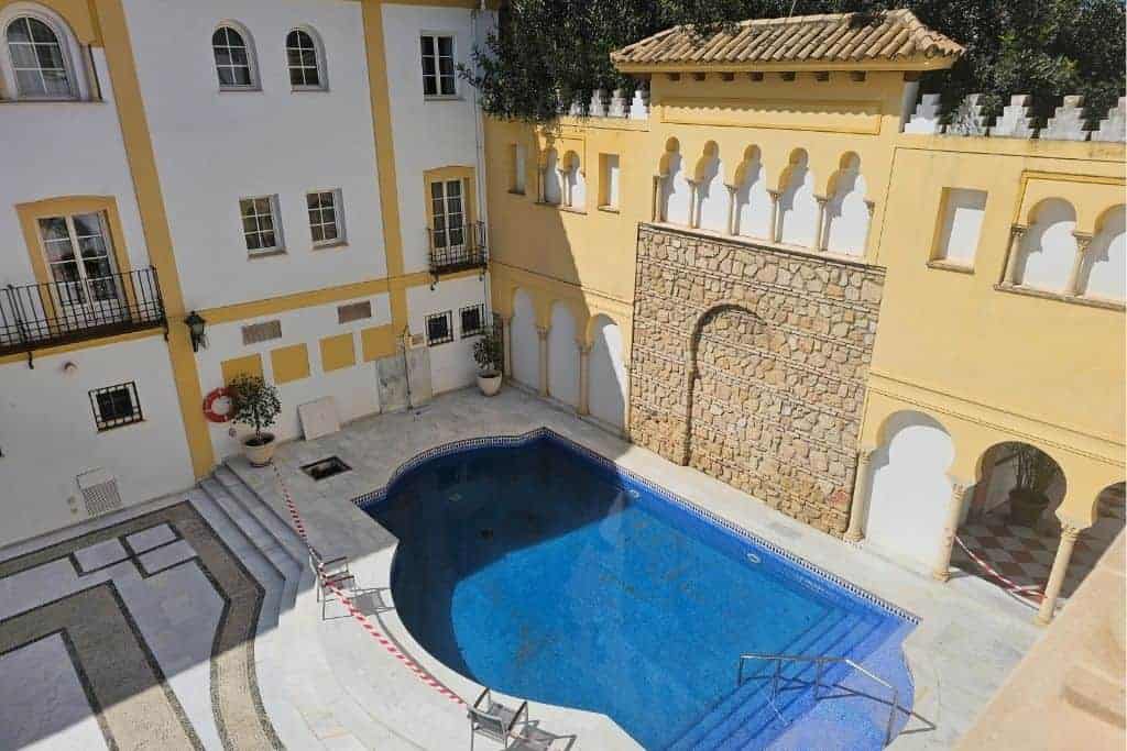 Andalusian courtyard and pool at Hotel Maciá Alfaros in Córdoba – Moorish-style hotel stay for a 7-day southern Spain itinerary