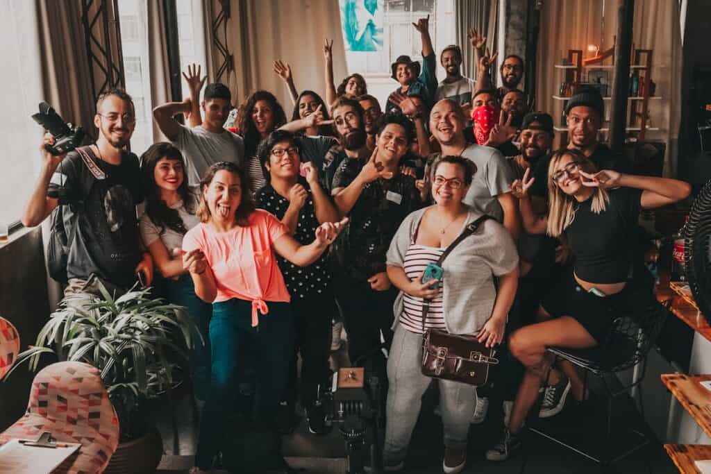 A Happy Community Looking at the Camera