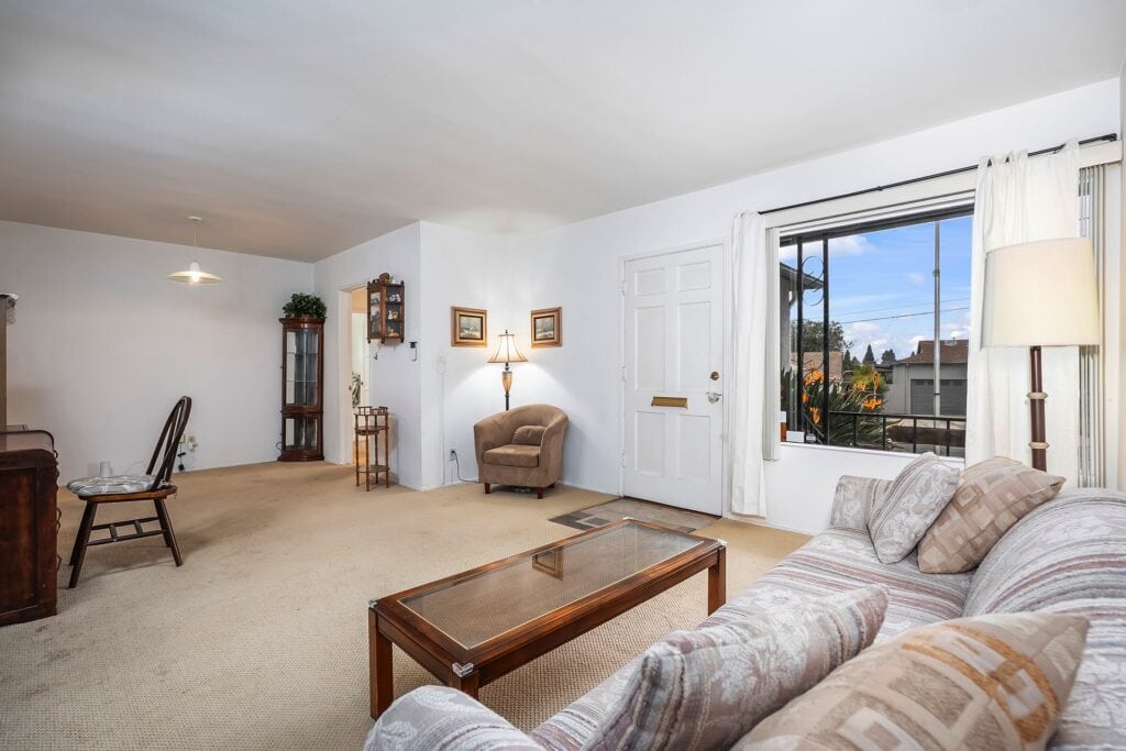 Spacious mid-century living room at 1751 39th St, San Diego, featuring original 1950s architecture