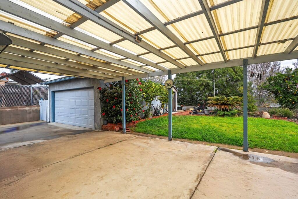 Expansive covered patio and backyard garden area at 1751 39th St, ideal for outdoor living in San Diego's 92105 area