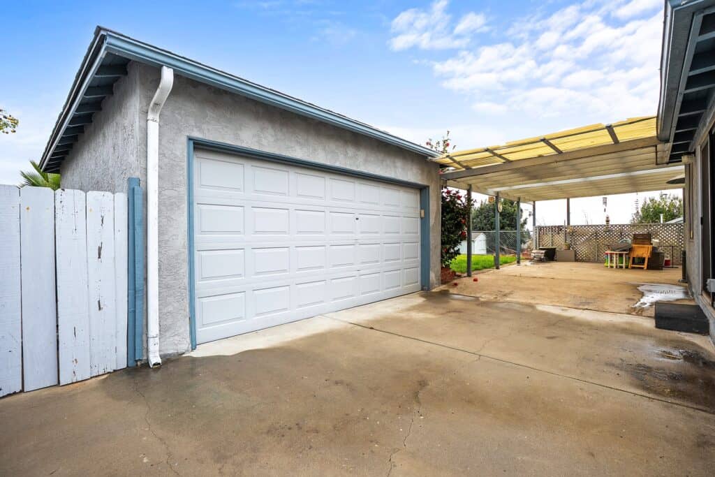 Detached two-car garage and covered concrete patio area at 1751 39th Street, offering outdoor living space in the Fairmount Park neighborhood of San Diego