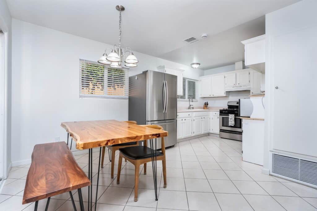 Close-up of the kitchen workspace at 2170 Montclair St in North Park highlighting updated appliances and ample counter space.