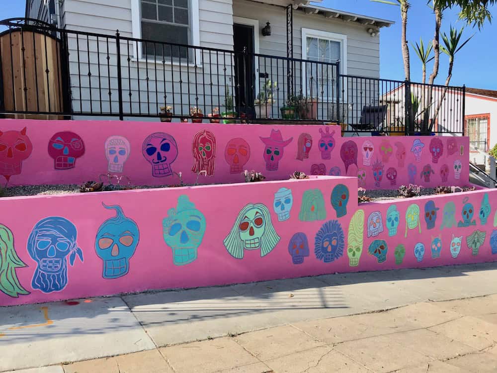 Golden Hill Colorful Mural on wall infront of home