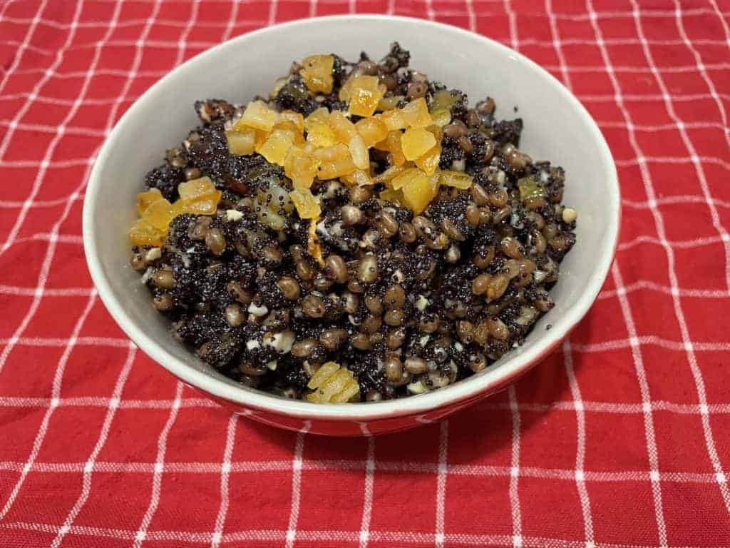 Kutia wheatberry dessert in a white bowl.