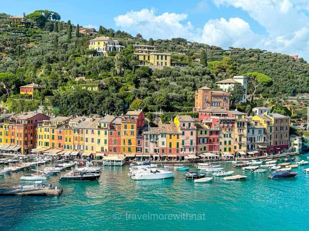 The colourful houses lining the marina of Portofino, with the turquoise waters in the foreground. A picture-perfect day trip from Portofino.