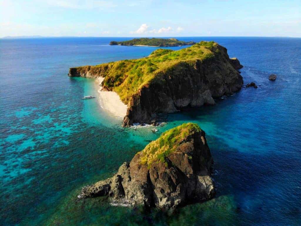 26 Beautiful Islands in Asia to Add to Your Bucket List 2024 9 drone view of deserted islands of Caramoan in the Philippines surrounded by turquoise clear waters with white sand beaches. this is one of the hidden gem islands in asia