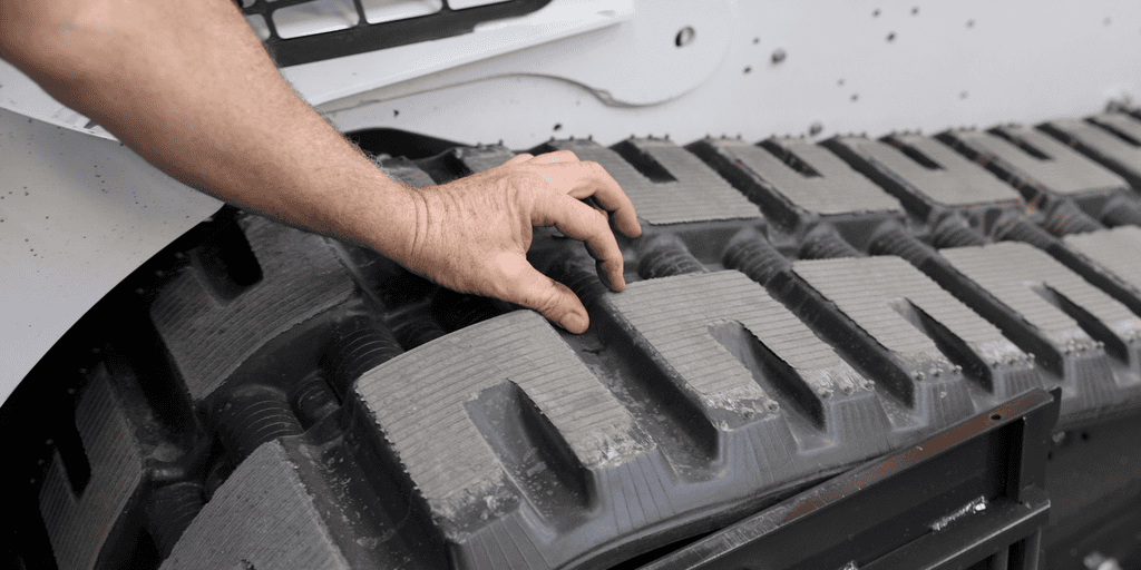 4. Inspect Tracks or Tires for Wear