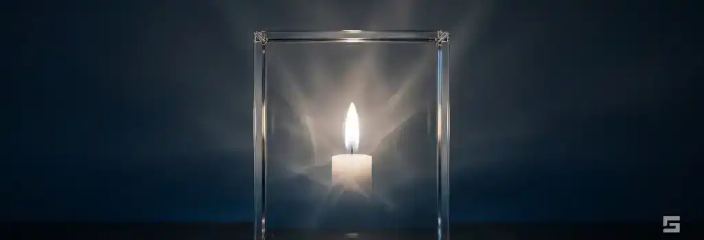A solitary candle flame encased in clear glass against a charcoal background, representing solemn justice for wrongful death. Civil rights litigation by Grano Law Offices, P.C.