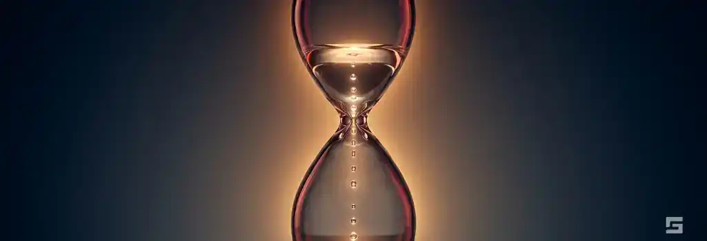 A clear glass hourglass with flowing water droplets illuminated by a comforting amber light, representing the timeline of a wrongful death lawsuit. Civil litigation guidance by Grano Law Offices, P.C.