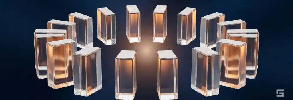 Twelve clear glass blocks arranged in an arc glowing with amber and white light on a deep navy background, representing a jury trial in a New Mexico criminal court. Elite trial representation and defense by Grano Law Offices, P.C.