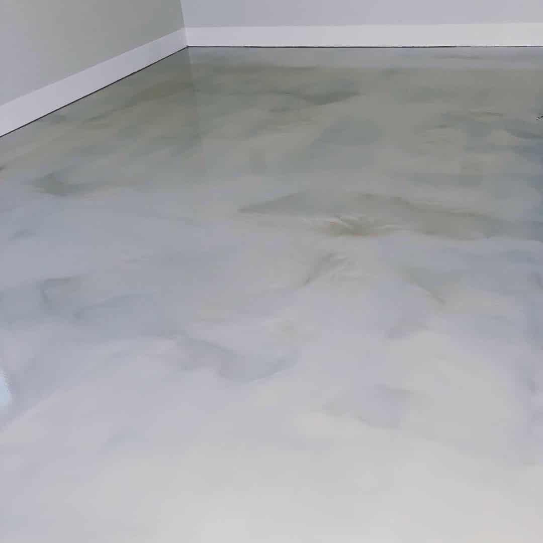 Polished concrete floor with a smooth, glossy finish in a modern interior, ideal for residential and commercial spaces by Minnesota concrete contractor.