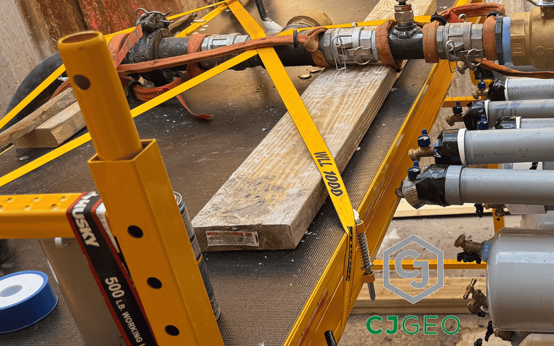 Multiple PVC conduits extending from the end of a tunnel inside of a shaft on a CJGeo thermal grouting project.