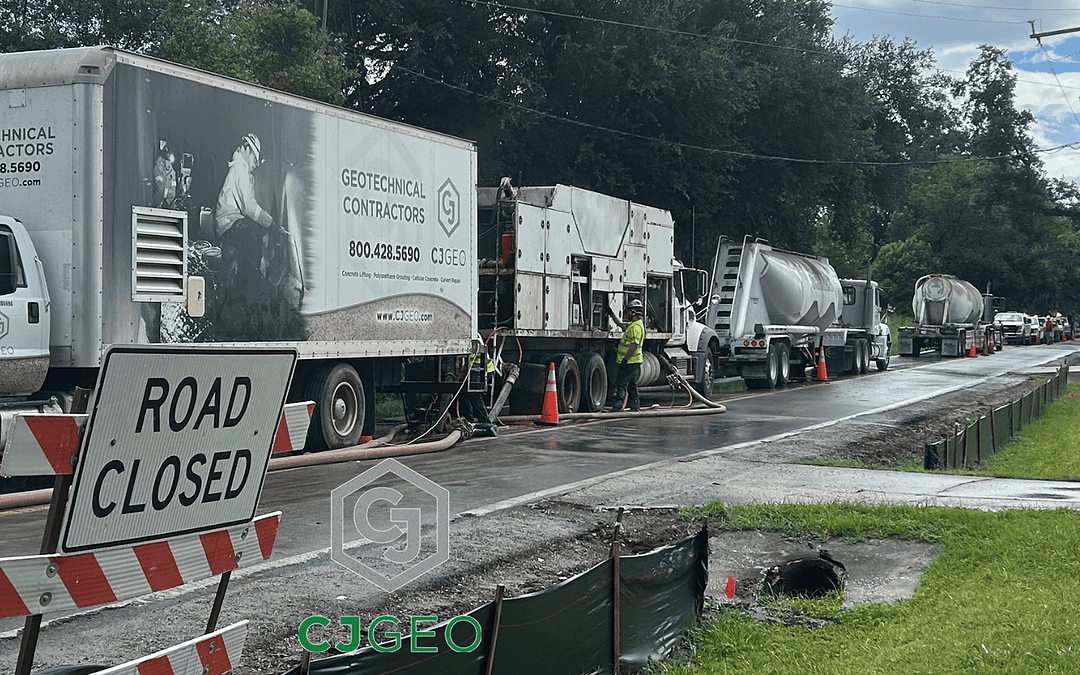 CJGeo cellular concrete batching equipment and cement tankers on site of a Florida lightweight fill project