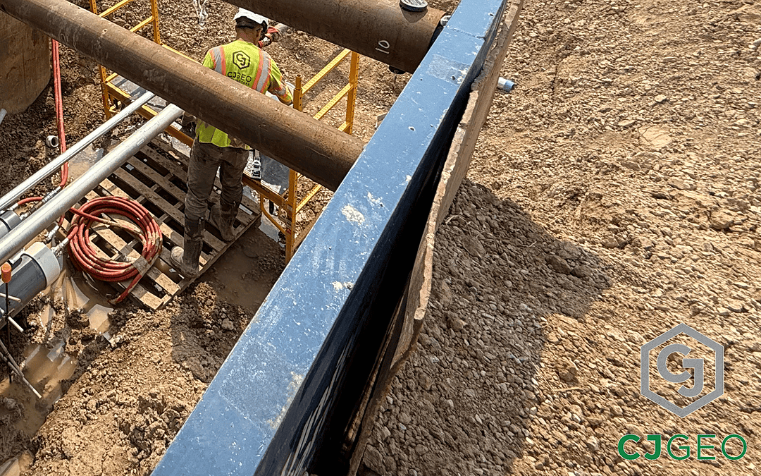 Multiple electrical conduits extending beyond a jack & bore casing on a thermal grouting project.