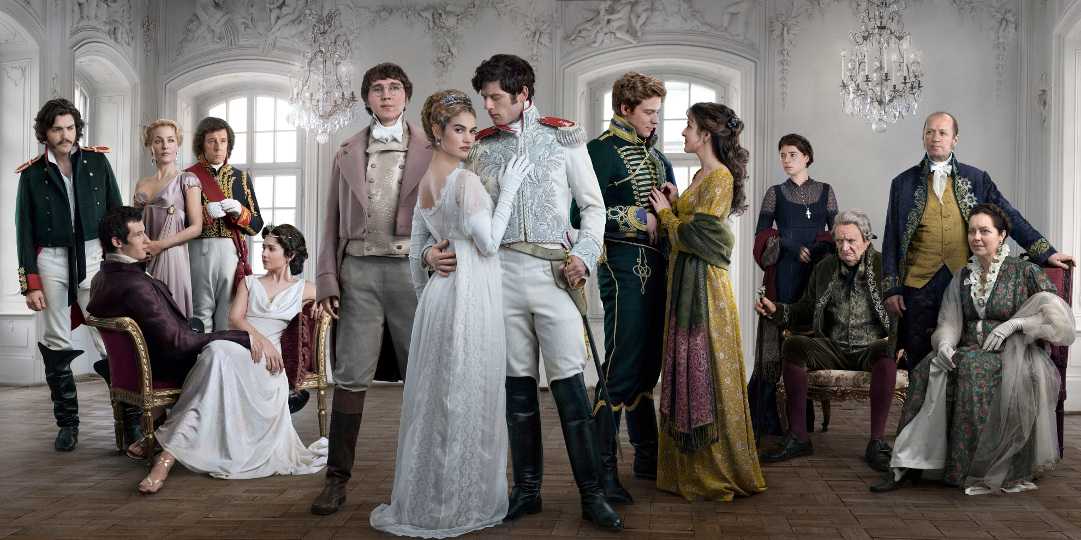 Picture Shows: (L-R) Dolokhov (TOM BURKE), Anatole Kuragin (CALLUM TURNER), Anna Pavlovna (GILLIAN ANDERSON), Prince Vassily Kuragin (STEPHEN REA), Helene Kuragin (TUPPENCE MIDDLETON), Pierre Bezukhov (PAUL DANO), Natasha Rostov (LILY JAMES), Prince Andrei (JAMES NORTON), Nikolai Rostov (JACK LOWDEN), Sonya (AISLING LOFTUS), Princess Marya (JESSIE BUCKLEY), Prince Bolkonsky (JIM BROADBENT), Eddie (ADE EDMONDSON), Countess Rostov (GRETA SCACCHI) - (C) BBC - Photographer: Mitch Jenkins