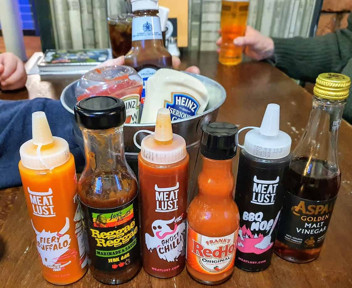 A selection of sauces and condiments on a table at the Horn in Hand, Nottingham