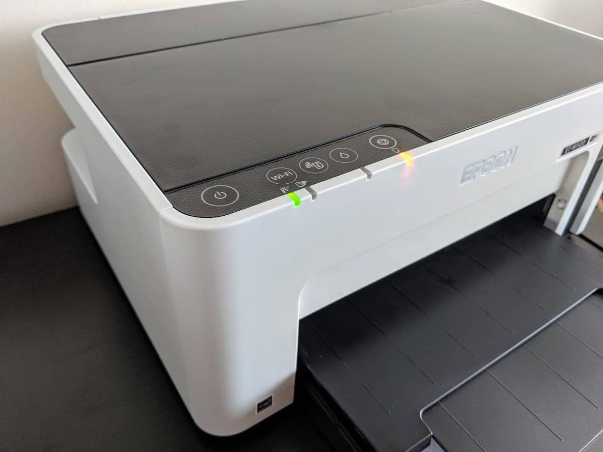Close up of printer showing buttons used to operate it.