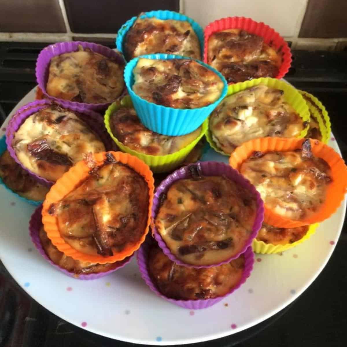 plate with a stack of mini quiches made in silicone moulds