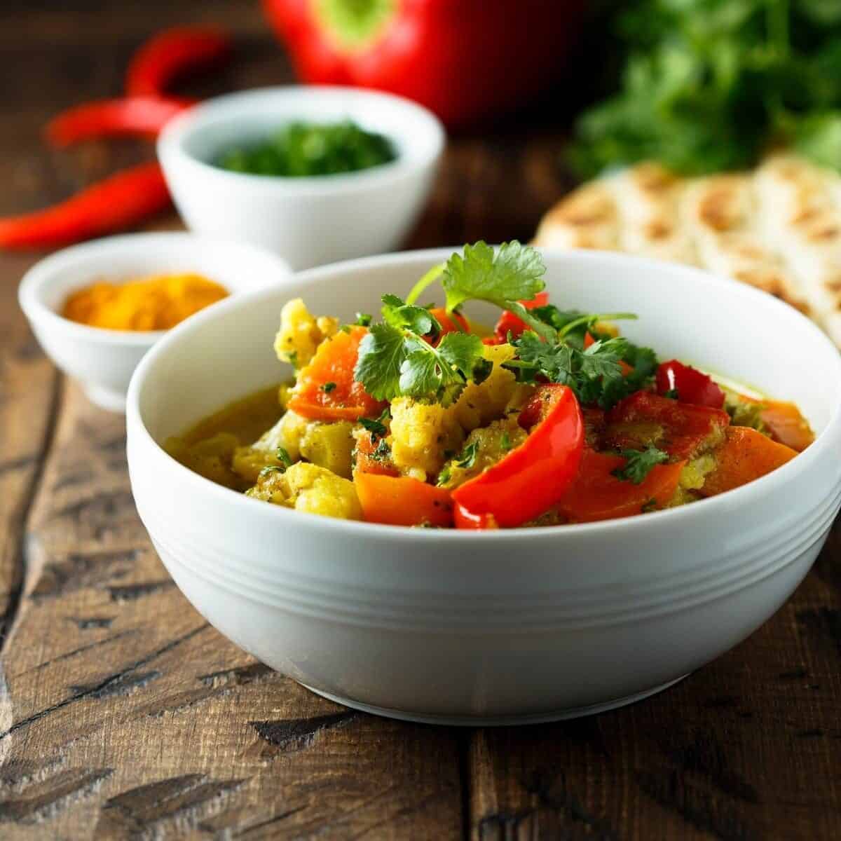 homestyle vegetable curry in a white bowl