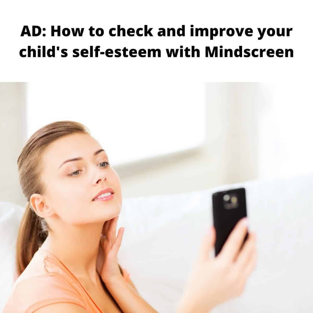Pinterest pin of brunette woman touching her face and holding her black phone in front of her
