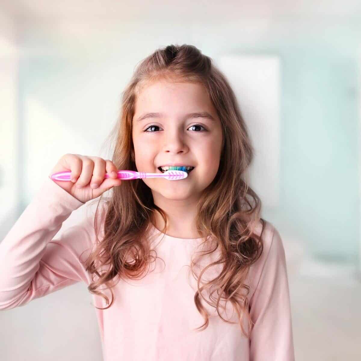 A person brushing the teeth